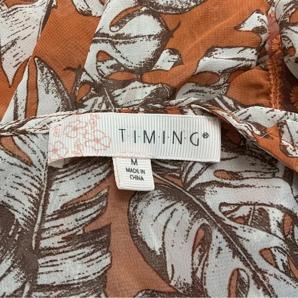 Timing Orange and White Leaf Pattern tie blouse - Picture 4 of 4